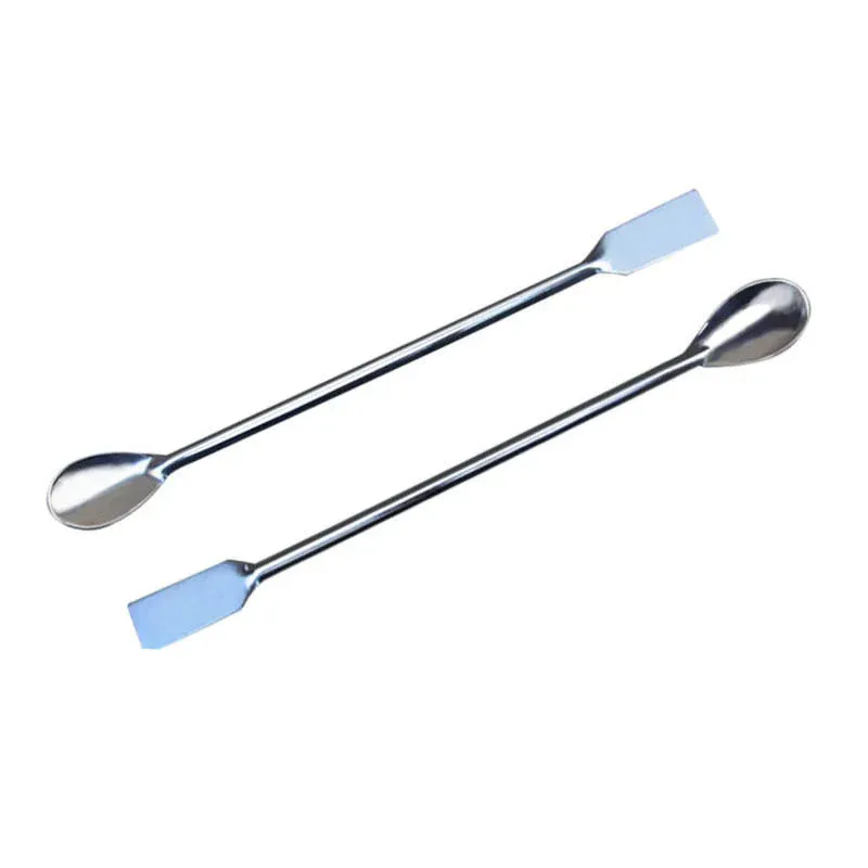 Laboratory sampling scoop on white background