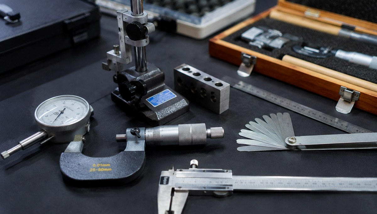 Practical laboratory and inspection tools on a workbench