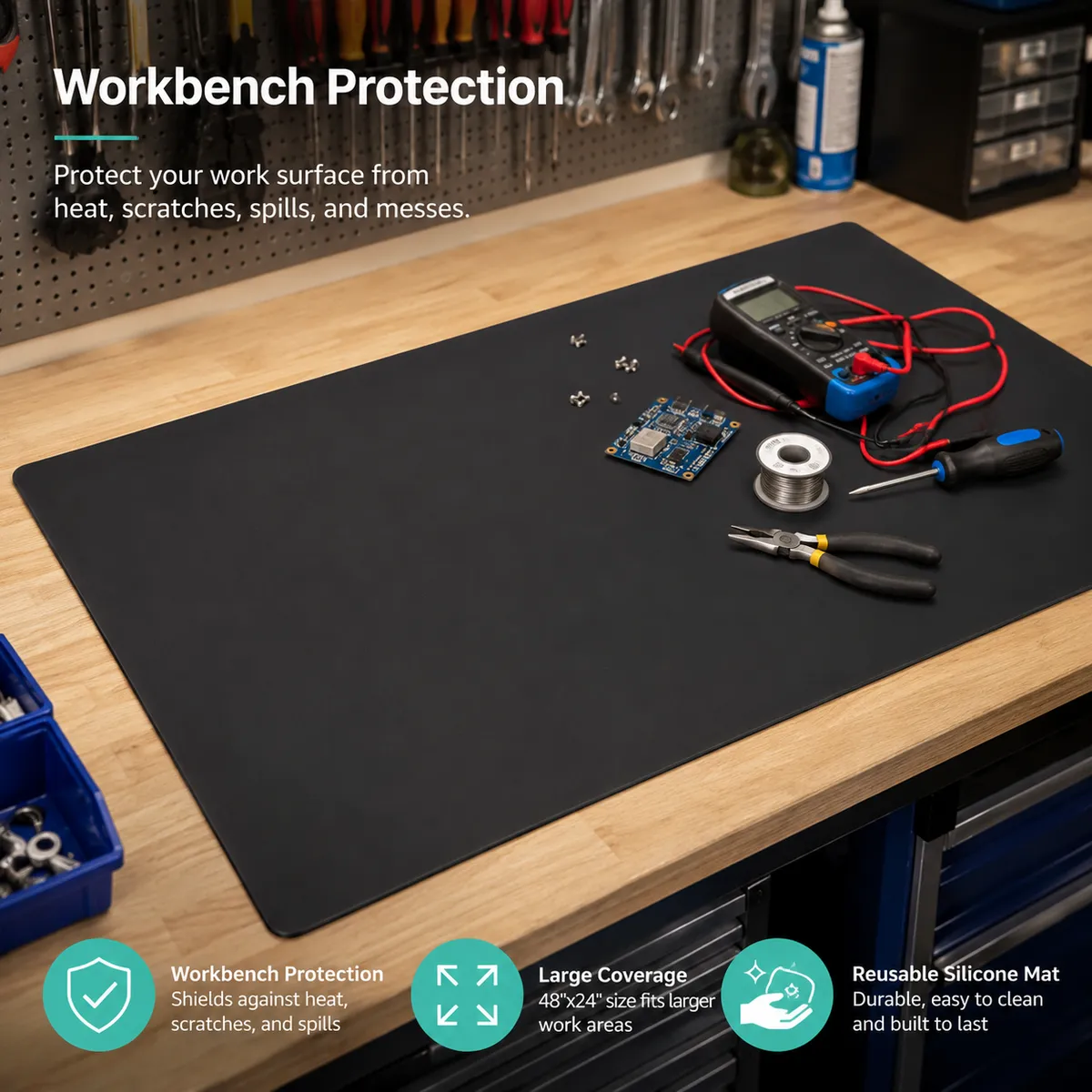 Black silicone workbench protection mat used on a workshop table with tools