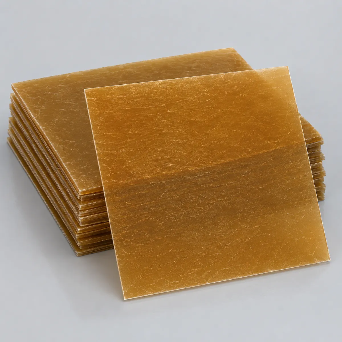 Amber mica sheet stack for electrical insulation and heat-resistant applications