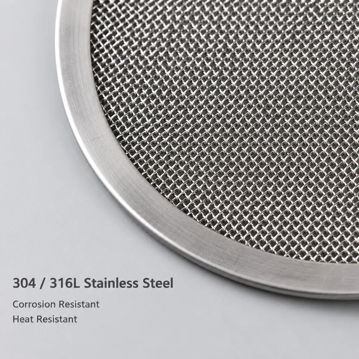 Close-up of 304 and 316L stainless steel woven mesh filter disc